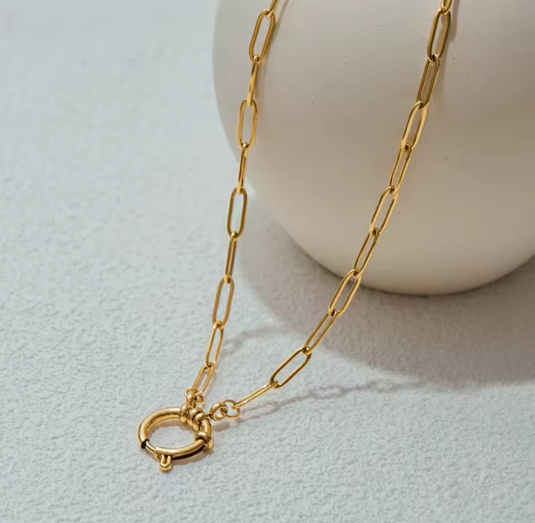 Goldfarbene Edelstahl-Gliederkette mit Herzanhänger und blauem Geburtsstein-Charm