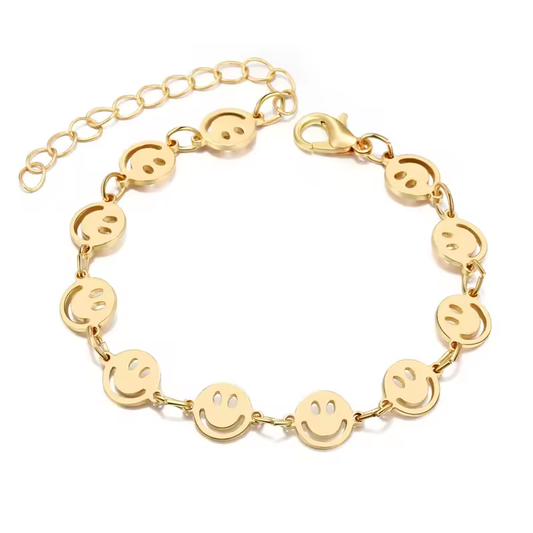 Vergoldetes Armband mit fröhlichen Smiley-Motiven aus Edelstahl – trendiger Damenschmuck, größenverstellbar und hypoallergen.